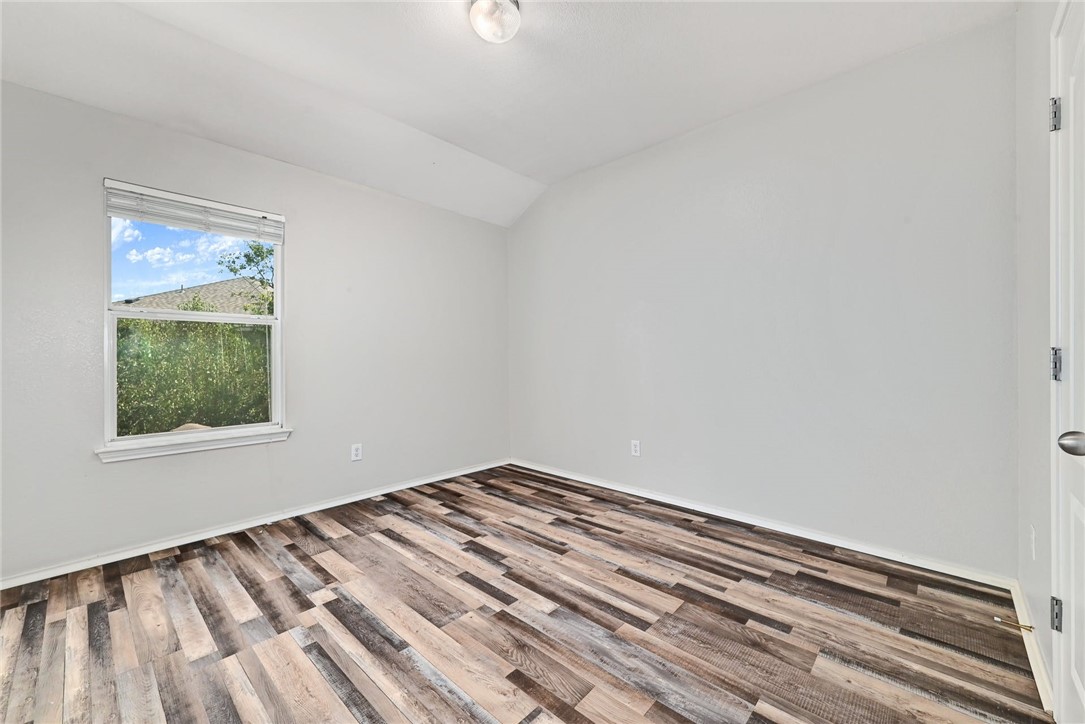 2049 Rachel Lane Round Rock, TX 78664 - Photo 26 of 36 a view of wooden floor and windows in a room