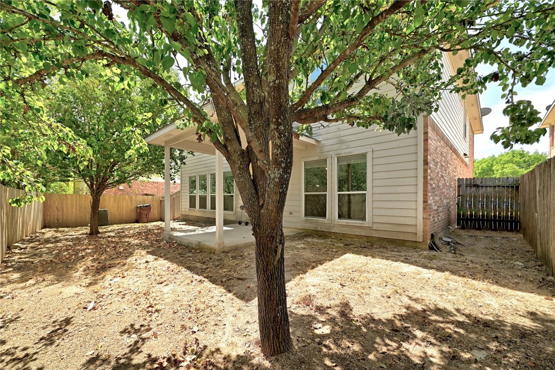 2049 Rachel Lane Round Rock, TX 78664 - Photo 29 of 36 a front view of a house with a yard covered in snow