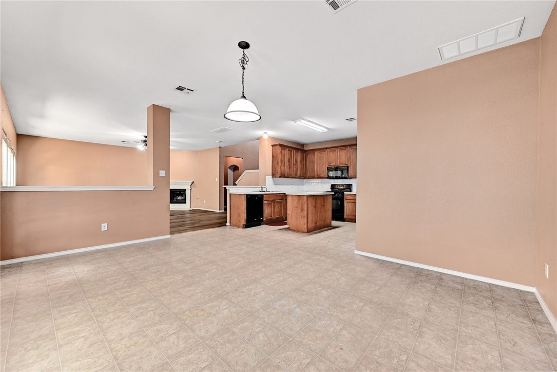 2049 Rachel Lane Round Rock, TX 78664 - Photo 8 of 36 a view of a kitchen with a sink and a window