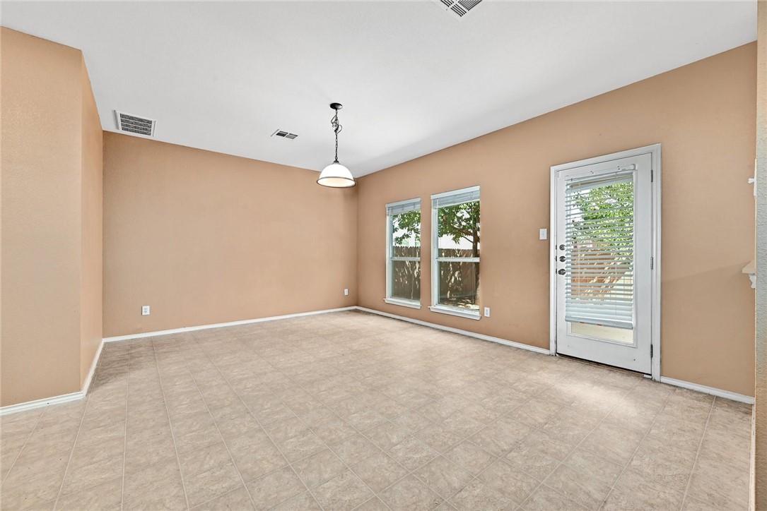 2049 Rachel Lane Round Rock, TX 78664 - Photo 9 of 36 a view of an empty room with a window