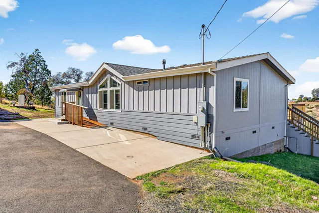 a view of a house with wooden floor
