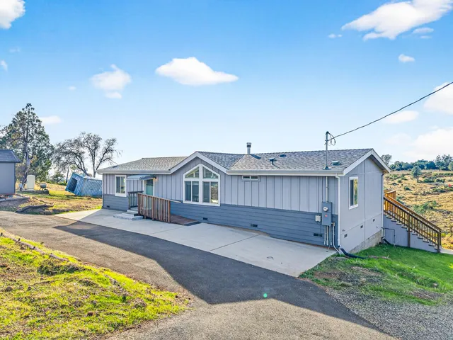 a view of a house with a swimming pool