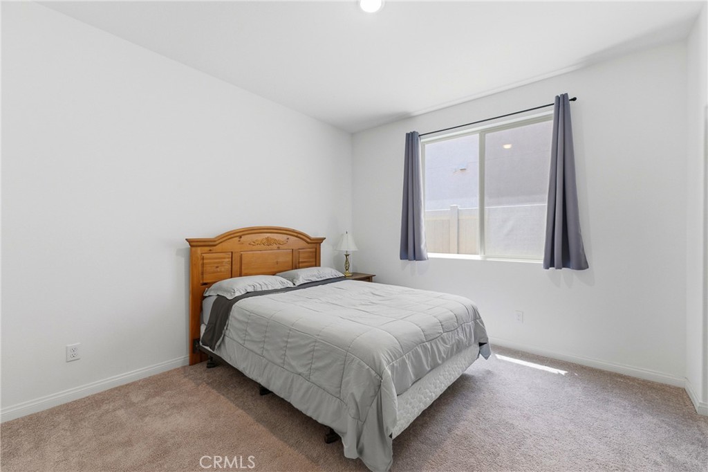 711 Ballesteros Street Perris, CA 92571 - Photo 19 of 39 Bedroom 3