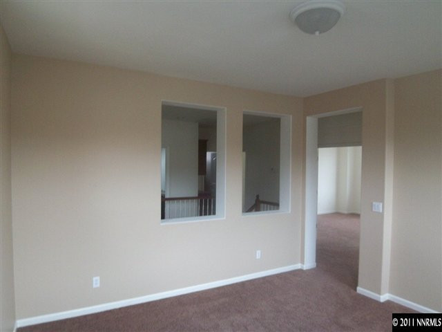 10641 Fire Poppy Circle Reno, NV 89521 - Photo 7 of 13 a view of an empty room