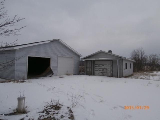 6363 East Bacon Road Osseo, MI 49266 - Photo 3 of 11 6363 Bacon Garage