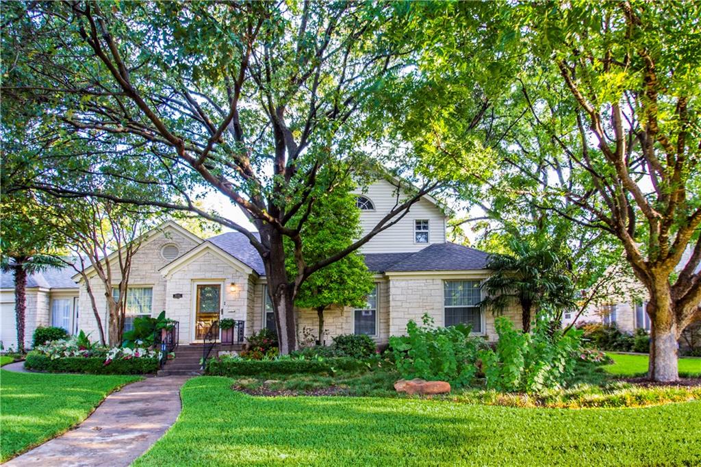 2045 Marydale Road Dallas, TX 75208 - Photo 1 of 1 a front view of a house with a yard and trees