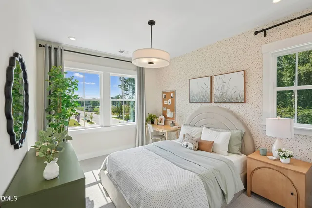 a view of a balcony with table and chairs and wooden floor