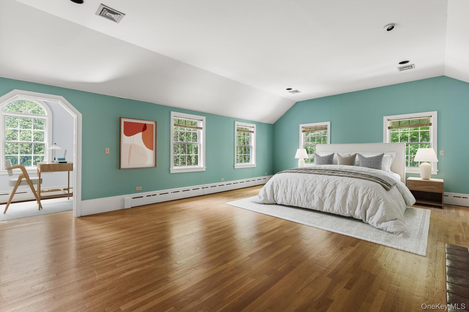 81 Glendale Road Ossining, NY 10562 - Photo 13 of 37 Virtually staged bedroom with vaulted ceiling, wood floors, and cast iron baseboard heating