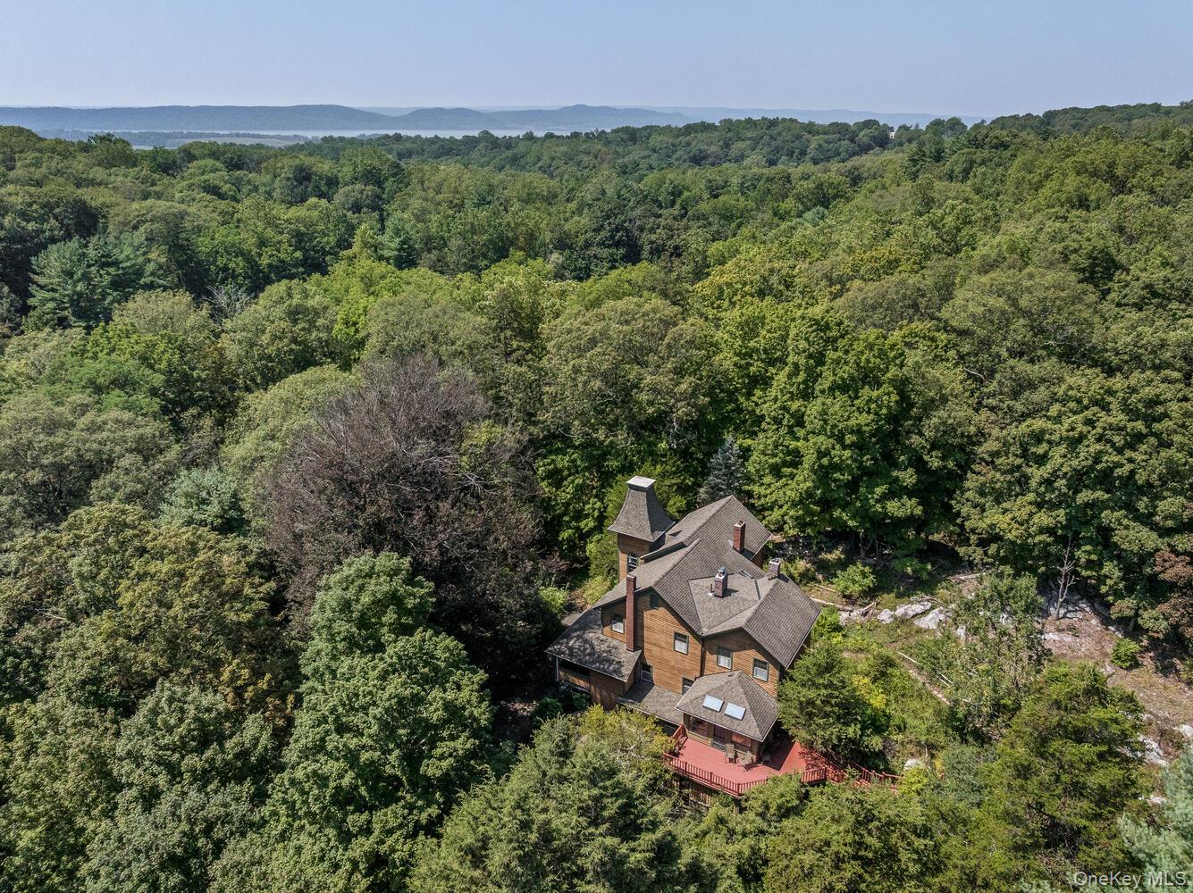 81 Glendale Road Ossining, NY 10562 - Photo 2 of 37 View from above of property featuring a forest
