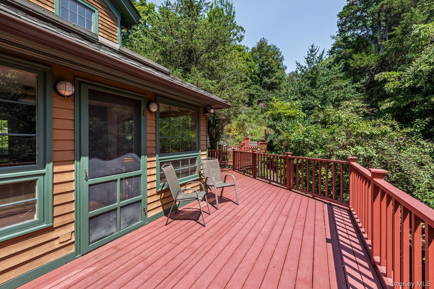 81 Glendale Road Ossining, NY 10562 - Photo 26 of 37 Wooden deck that is outside of the kitchen