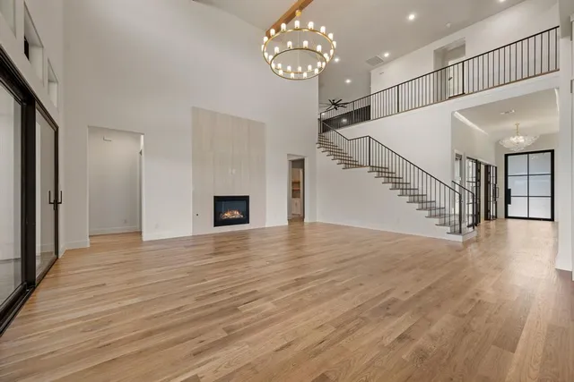 a large kitchen with a lot of counter space and a sink