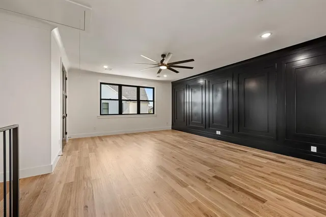 a bathroom with a toilet sink and shower