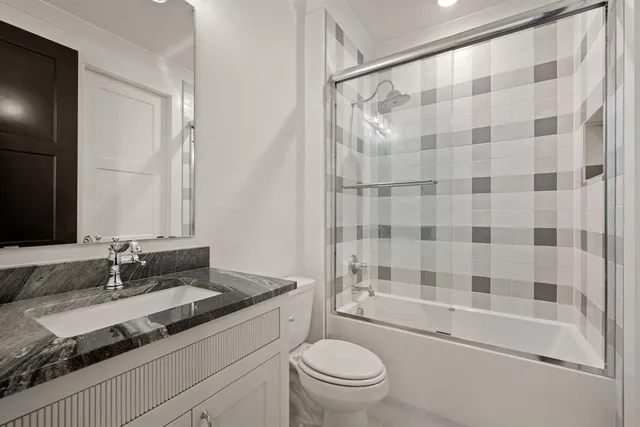 a view of an chairs and table in a yard