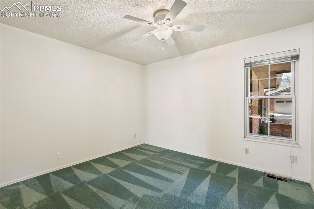 2051 Glenhill Road Colorado Springs, CO 80906 - Photo 16 of 32 Main level office with view to front entry