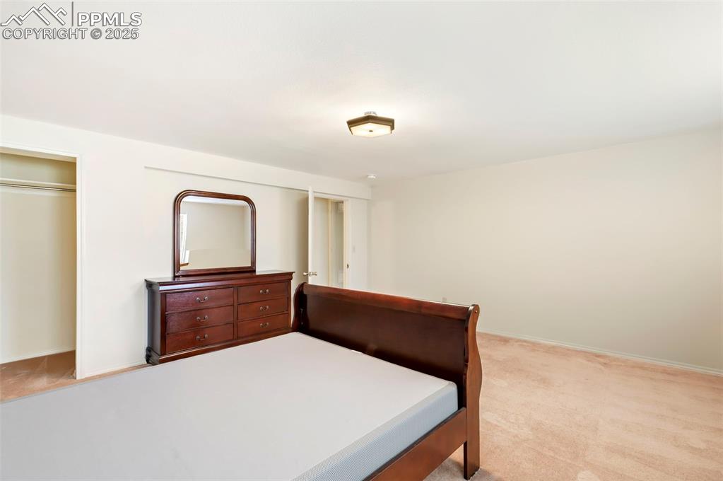 2051 Glenhill Road Colorado Springs, CO 80906 - Photo 25 of 32 Basement bedroom