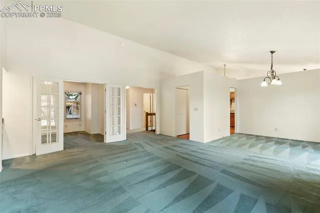 a kitchen with granite countertop a sink and a stove top oven