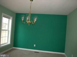 20525 Nanticoke Road Nanticoke, MD 21840 - Photo 2 of 6 a room with window and entryway