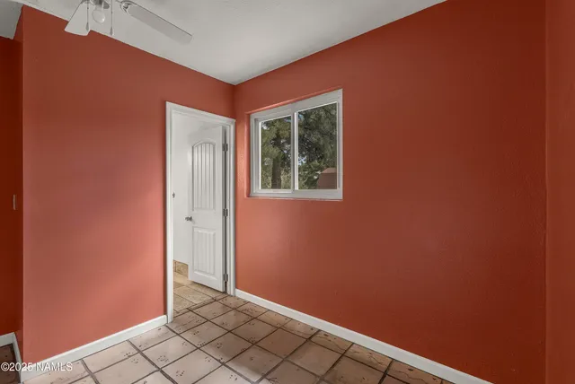 an empty room with windows