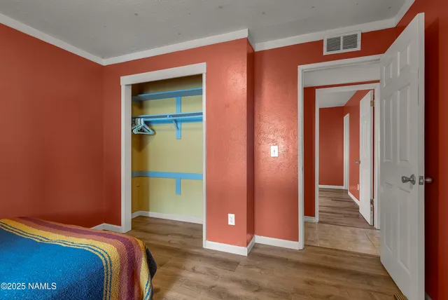 a view of bedroom with hallway