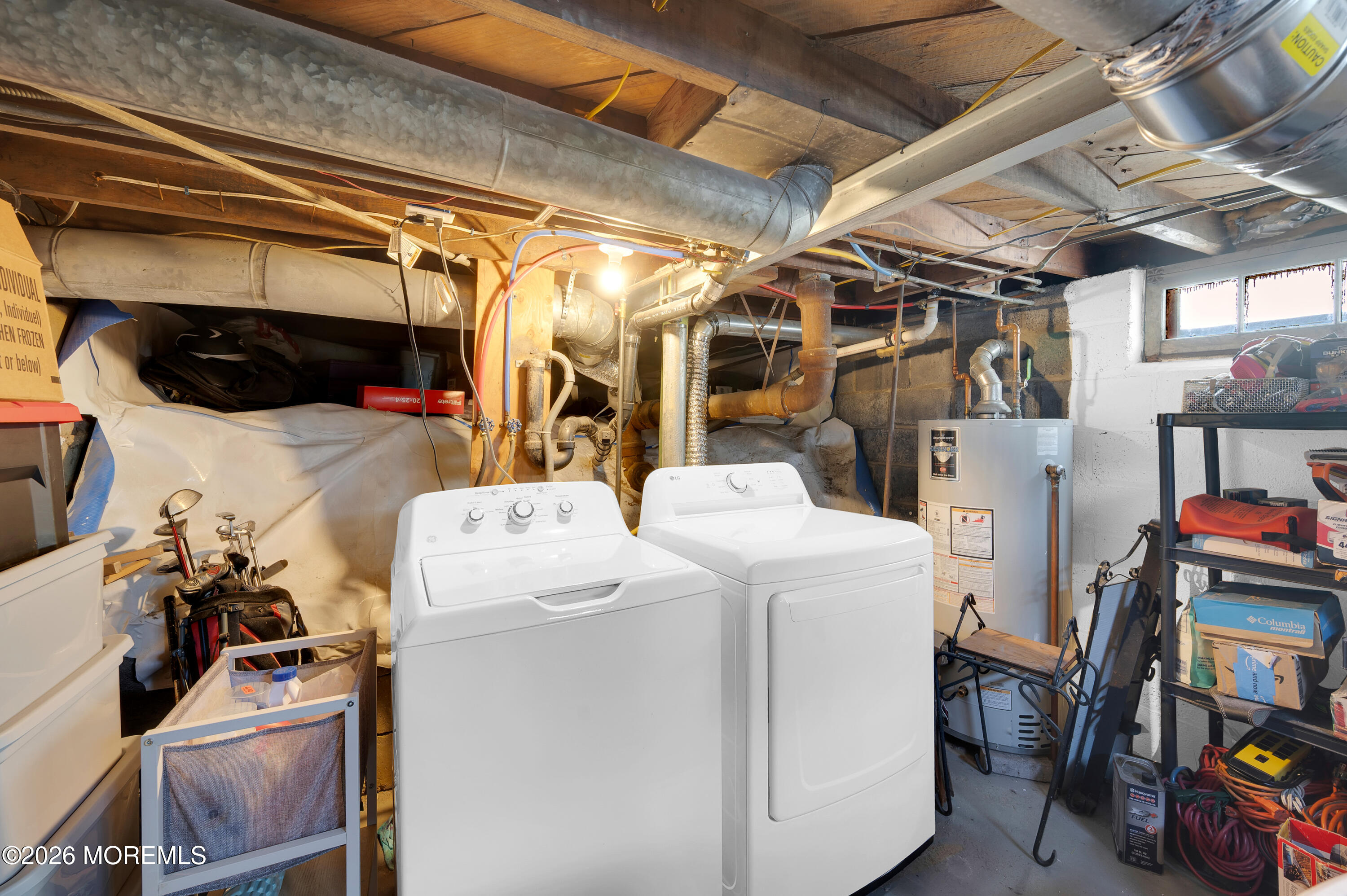 1429 Marconi Road Wall, NJ 07719 - Photo 8 of 21 a utility room with dryer and washer