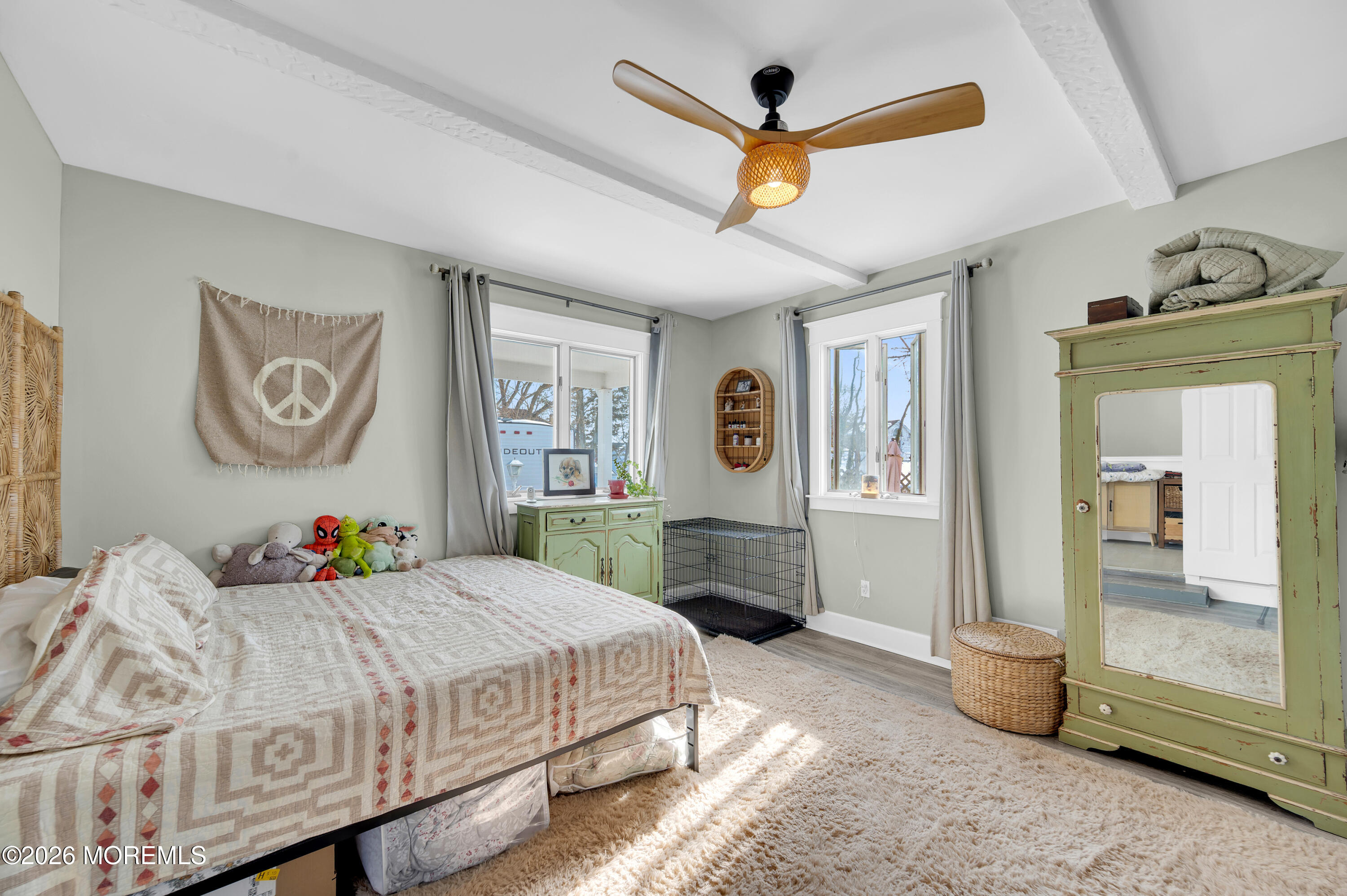1429 Marconi Road Wall, NJ 07719 - Photo 13 of 21 a bedroom with a bed and a large mirror on the dresser