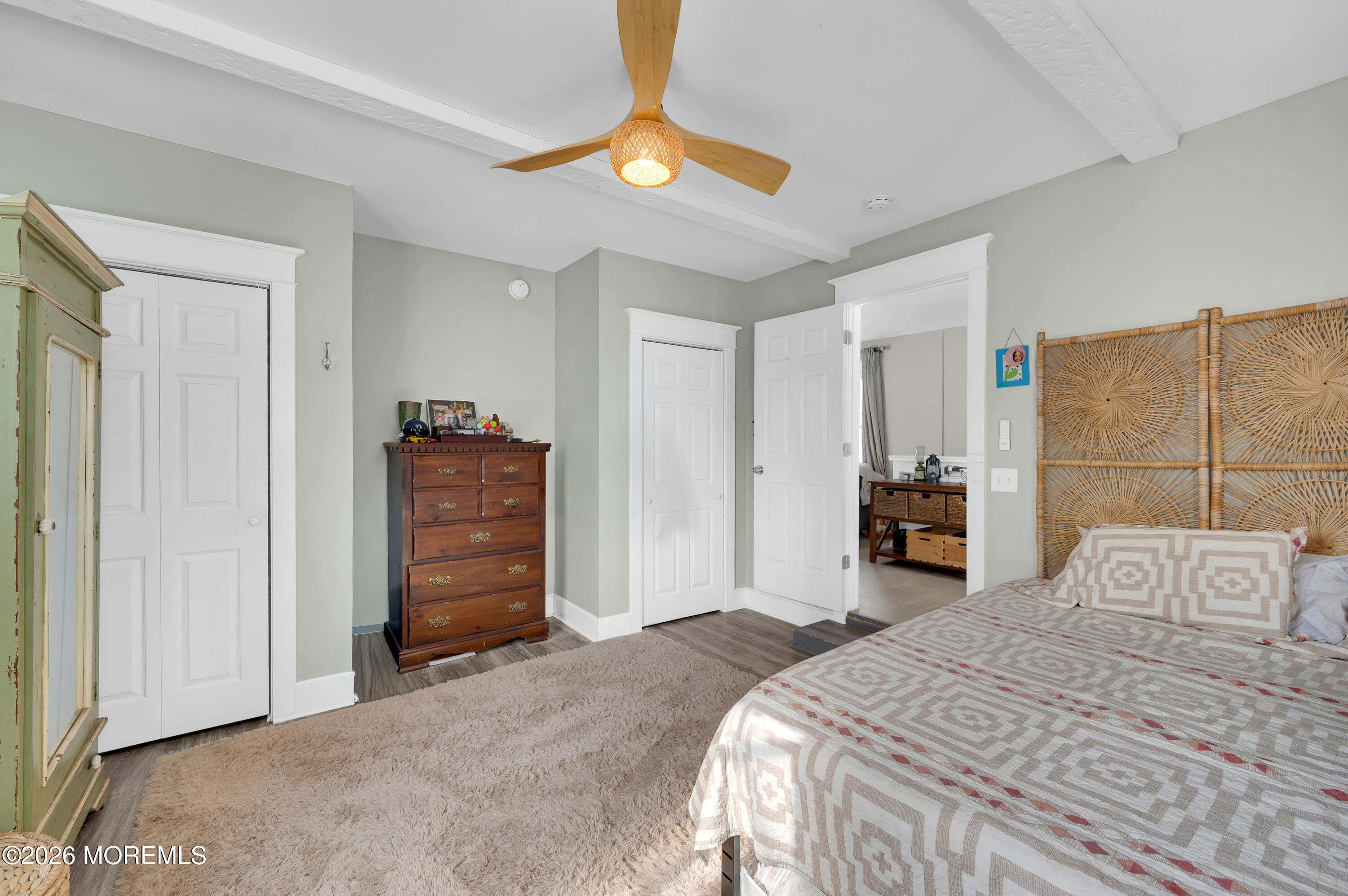 1429 Marconi Road Wall, NJ 07719 - Photo 14 of 21 a bedroom with a bed and a chandelier
