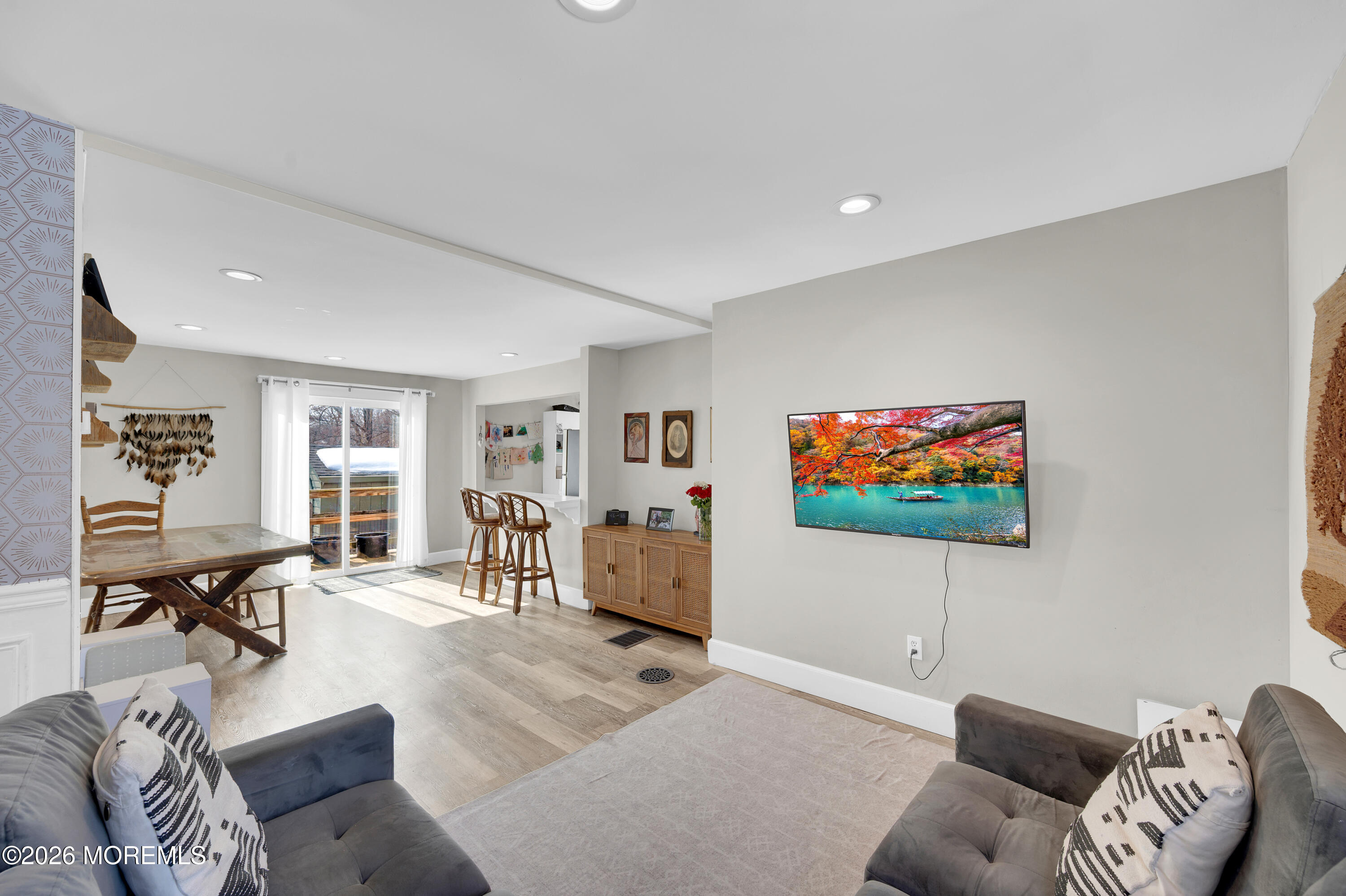 1429 Marconi Road Wall, NJ 07719 - Photo 15 of 21 a living room with furniture and a flat screen tv