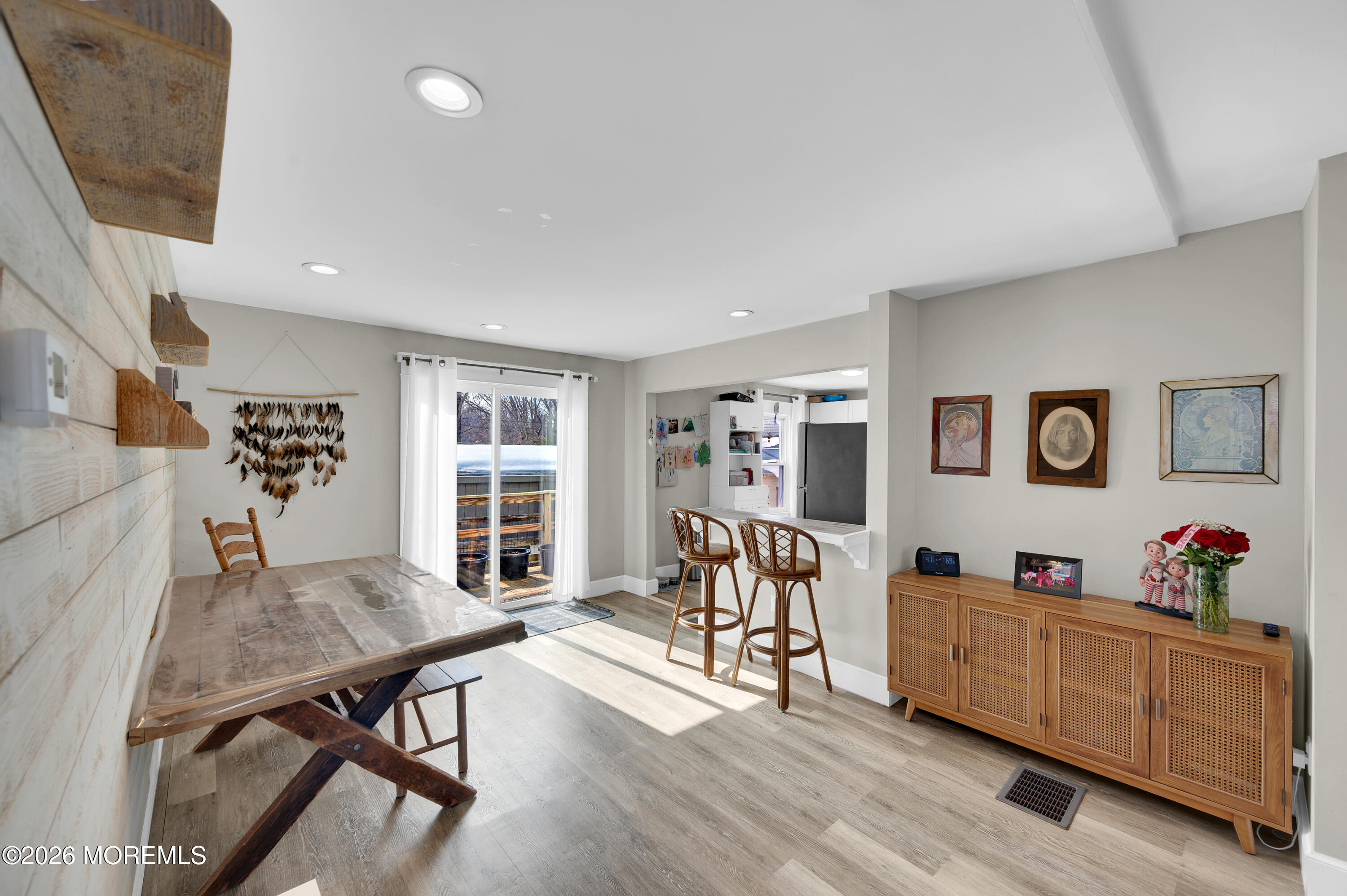 1429 Marconi Road Wall, NJ 07719 - Photo 16 of 21 a living room with furniture and a table