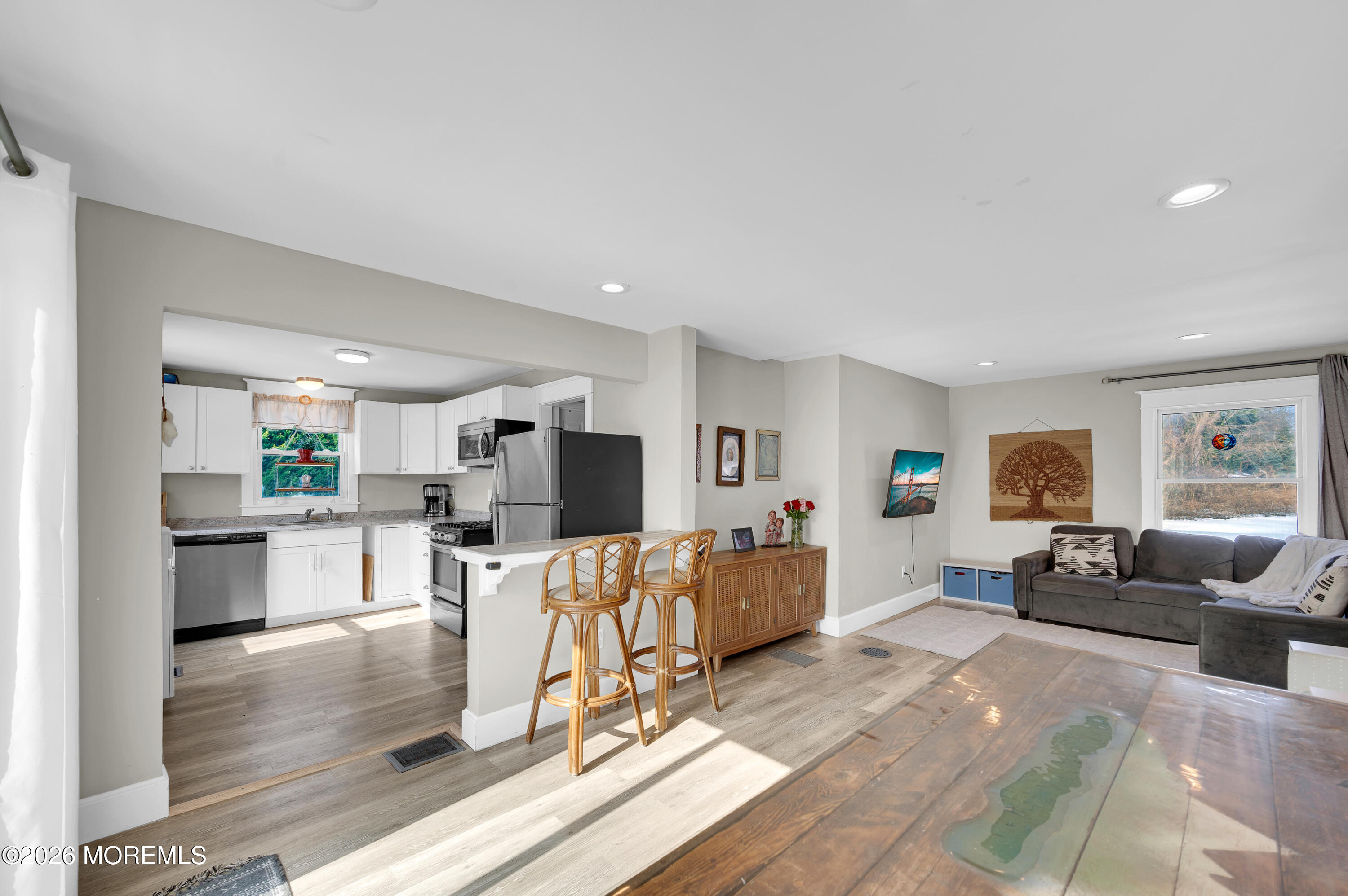 1429 Marconi Road Wall, NJ 07719 - Photo 2 of 21 a living room with fireplace furniture and a flat screen tv