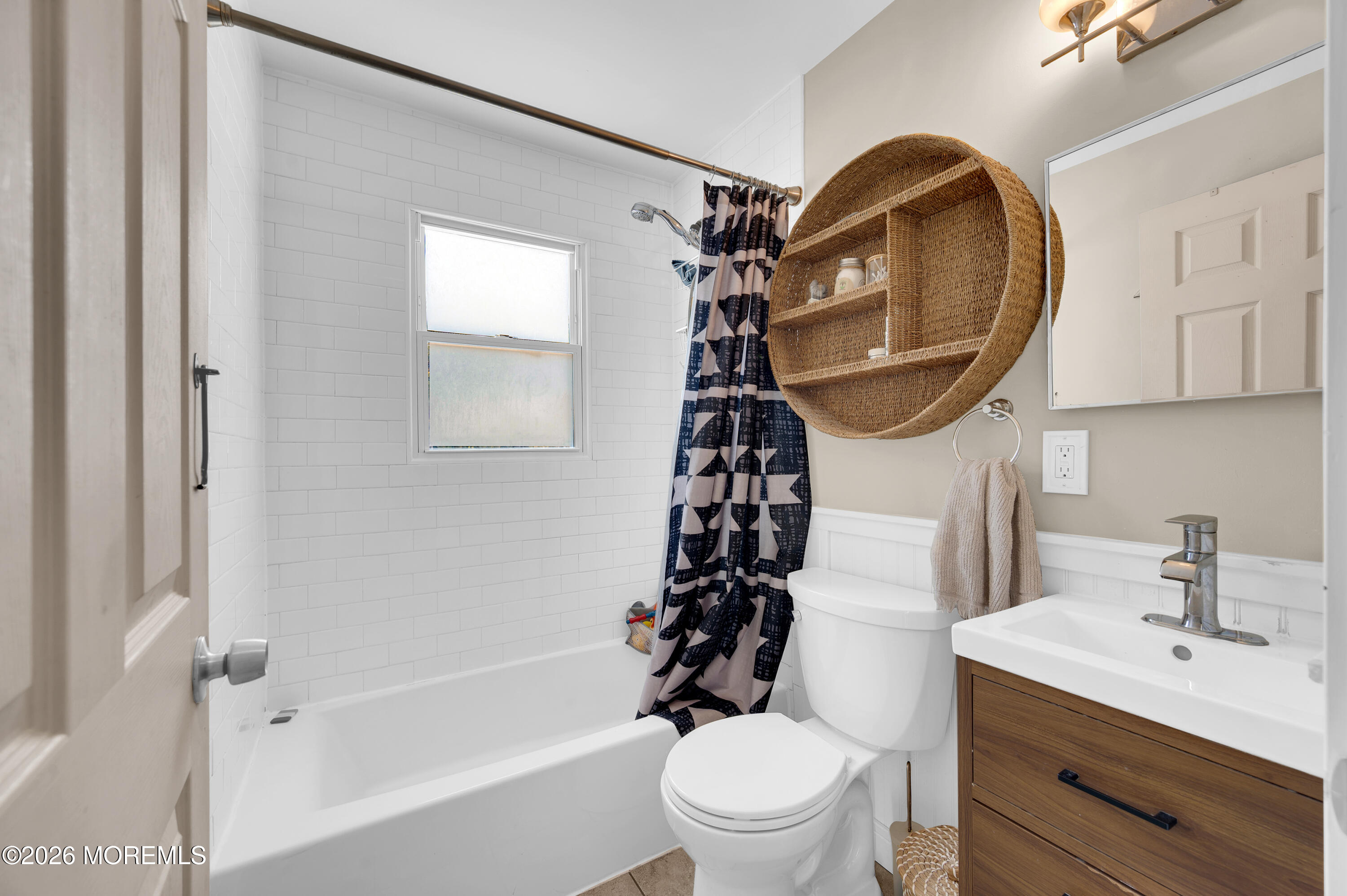 1429 Marconi Road Wall, NJ 07719 - Photo 5 of 21 a bathroom with a sink a toilet and a mirror