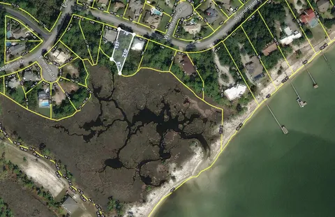 a view of a lake with a big yard