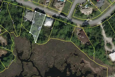 a sign that is sitting on a wooden wall