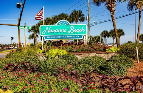 a front view of a house with tree s