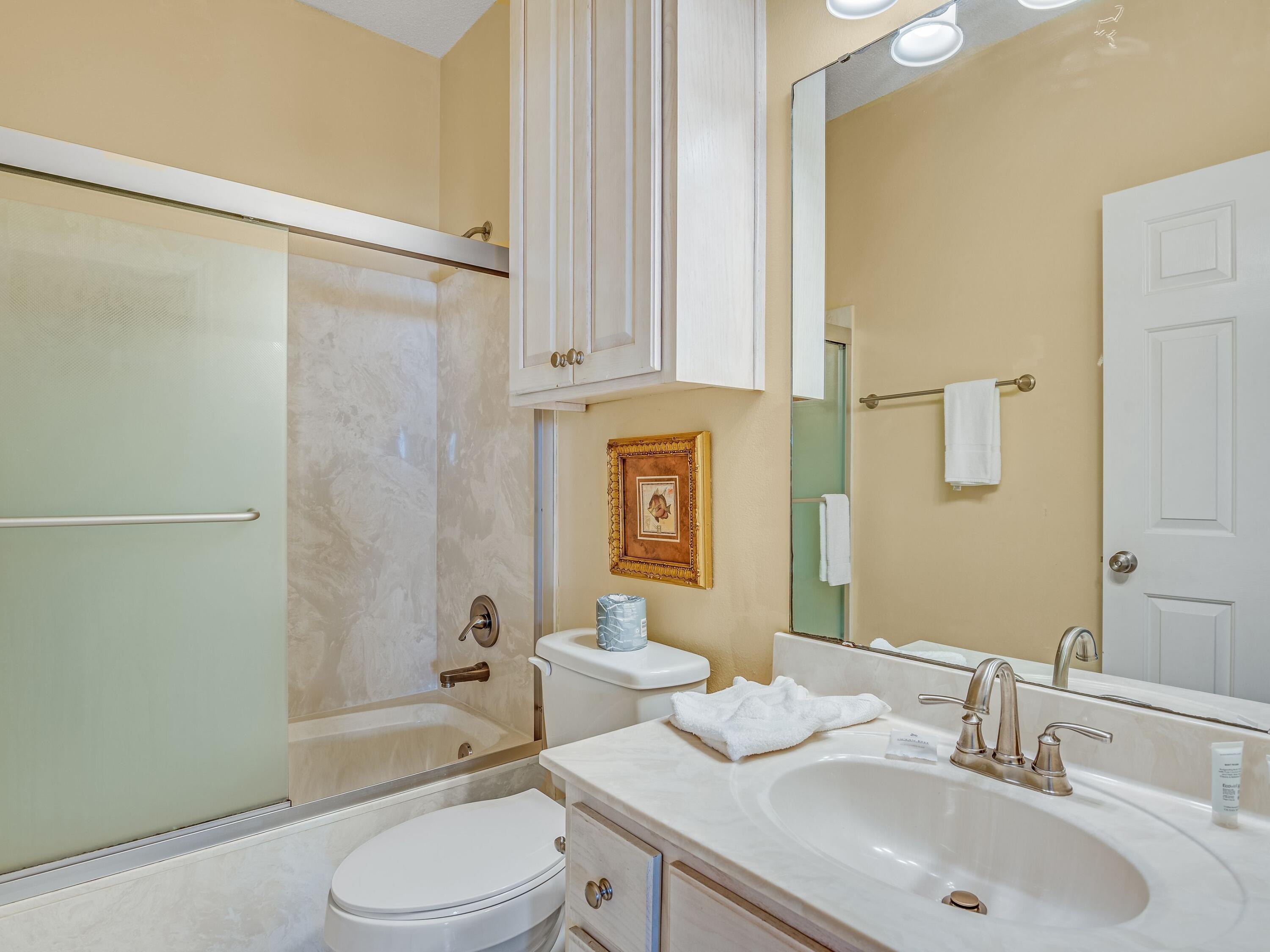 477 Old Beach Road Santa Rosa Beach, FL 32459 - Photo 29 of 35 a bathroom with a sink toilet and shower