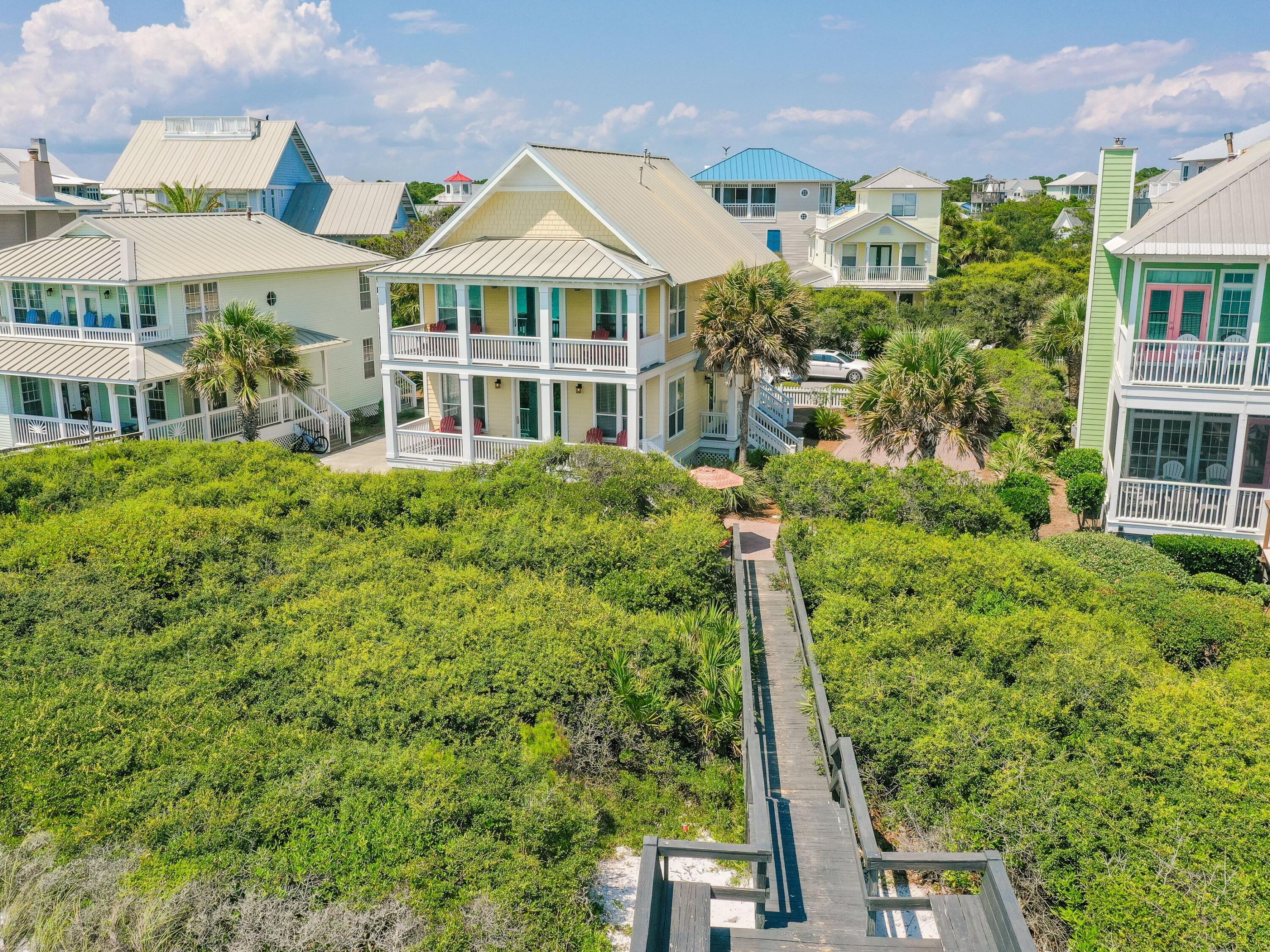 477 Old Beach Road Santa Rosa Beach, FL 32459 - Photo 8 of 35 a aerial view of a house with a garden