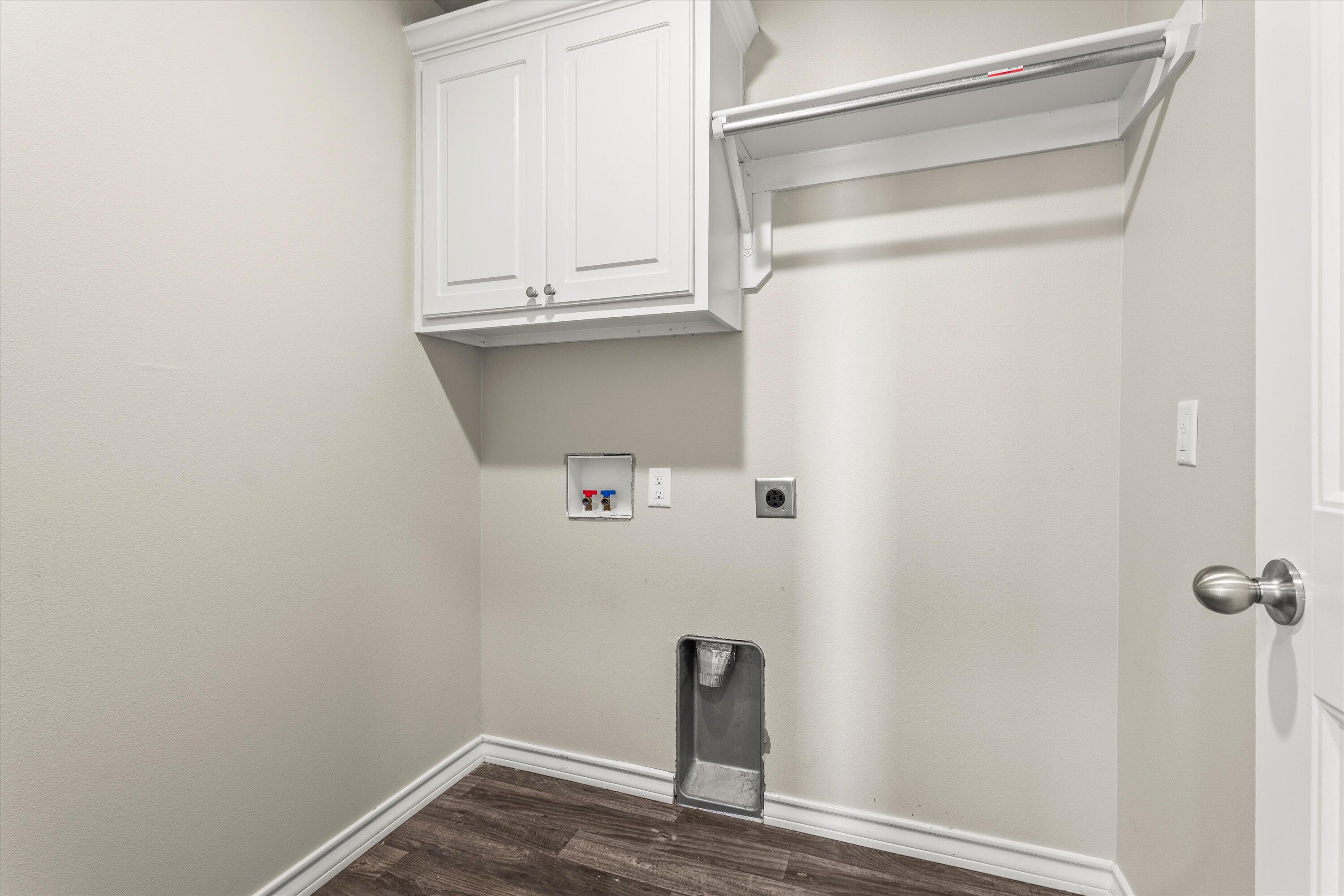 6040 24th Street, Unit 10 Lubbock, TX 79407 - Photo 26 of 29 a close view of utility room