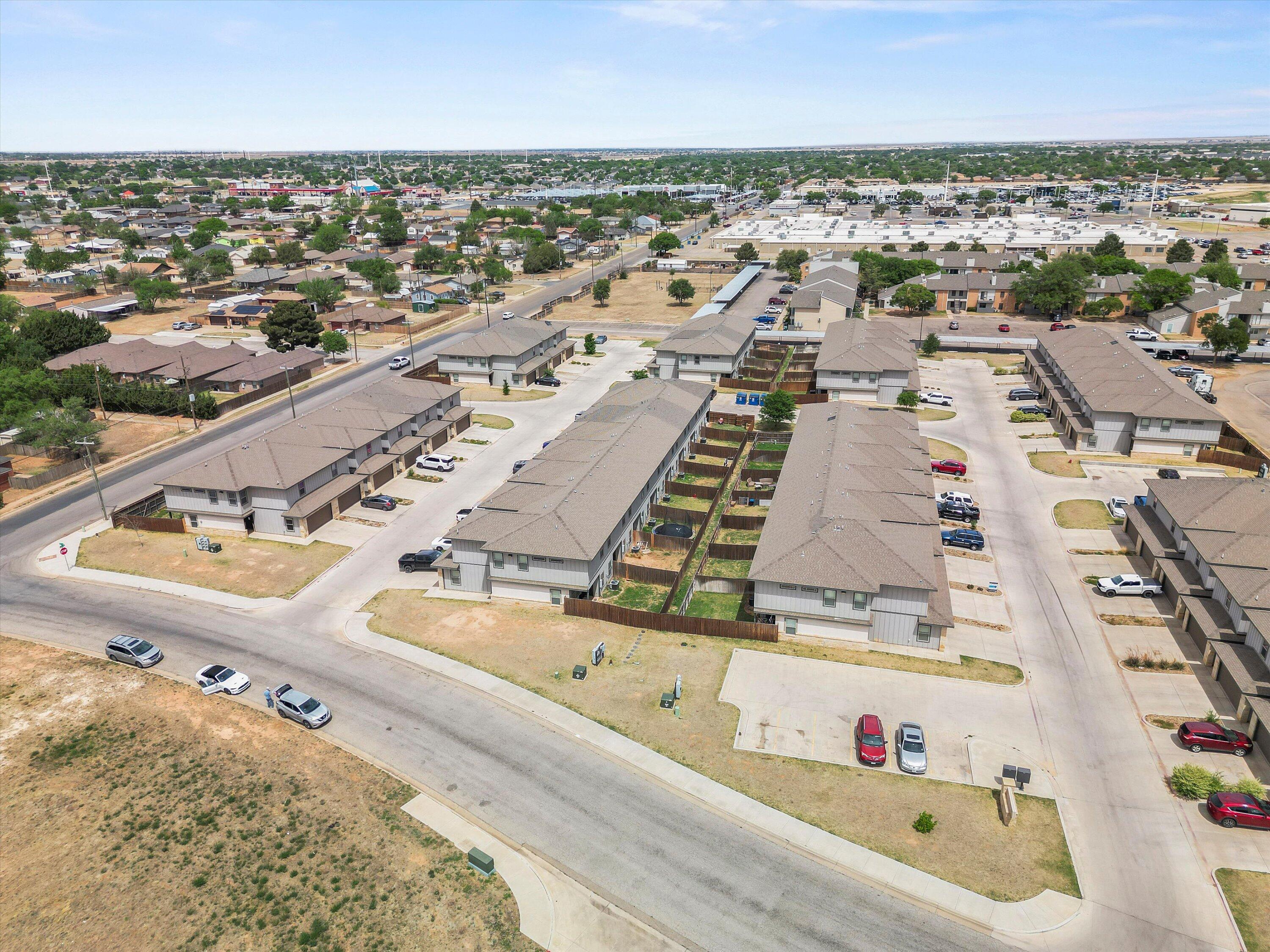 6040 24th Street, Unit 10 Lubbock, TX 79407 - Photo 6 of 29 an aerial view of a city