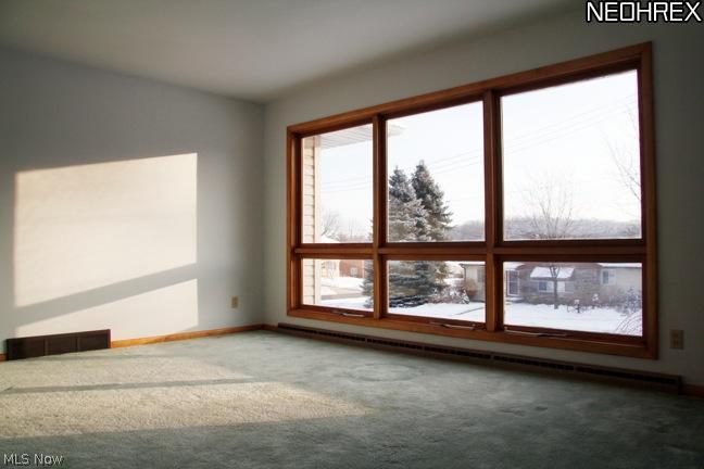 398 Herbert Road Akron, OH 44312 - Photo 9 of 25 View of large windows in living room allows plenty of sunshine