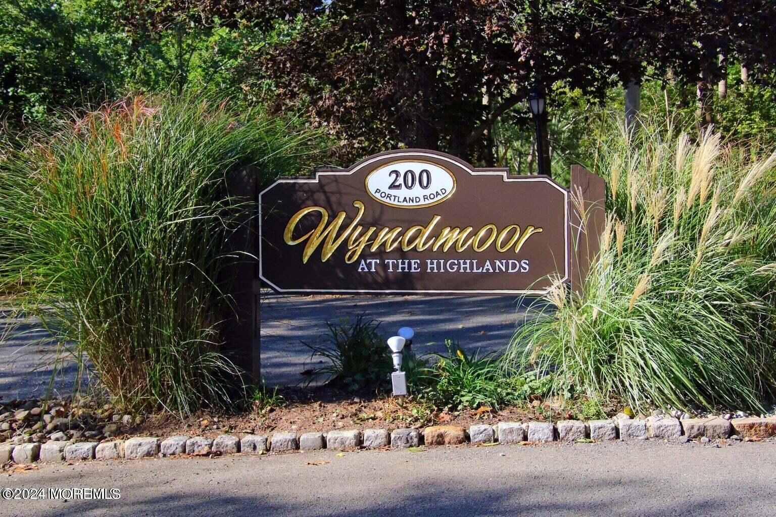 200 Portland Road, Unit D10 Highlands, NJ 07732 - Photo 1 of 16 a sign that is sitting on a brick wall
