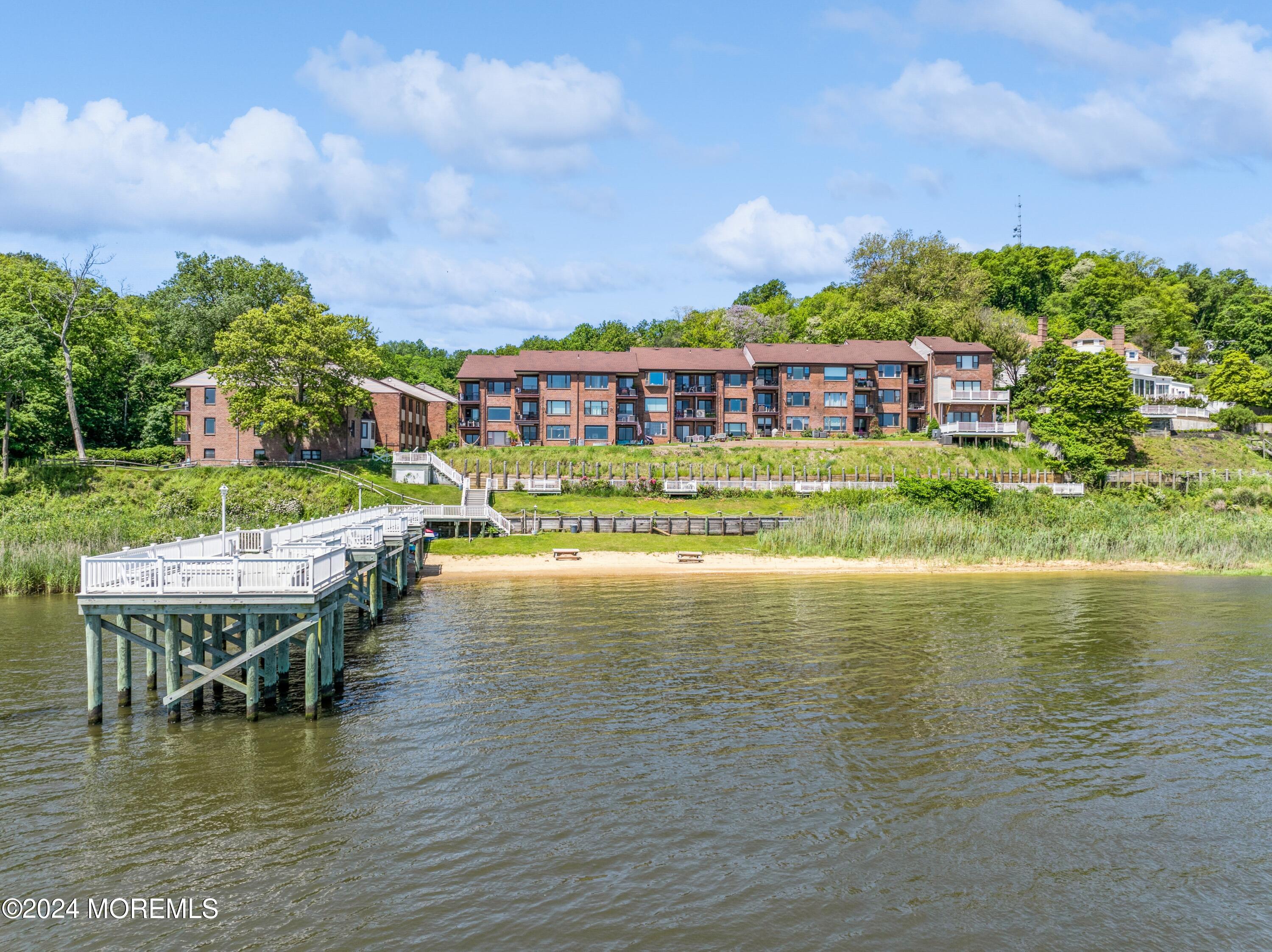 200 Portland Road, Unit D10 Highlands, NJ 07732 - Photo 4 of 16 a view of a lake with a house
