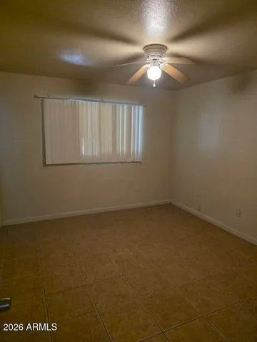 an empty room with a bathroom