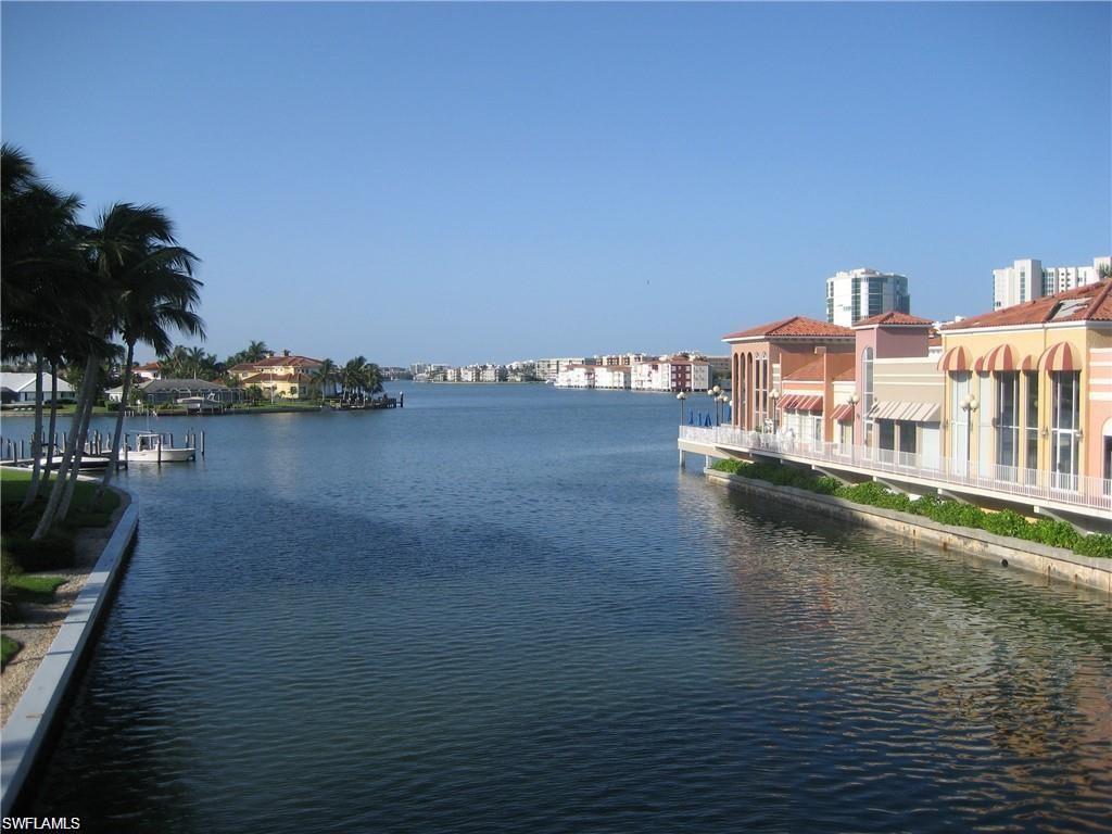 4160 Crayton Road, Unit A1 Naples, FL 34103 - Photo 14 of 17 a view of a city with water view