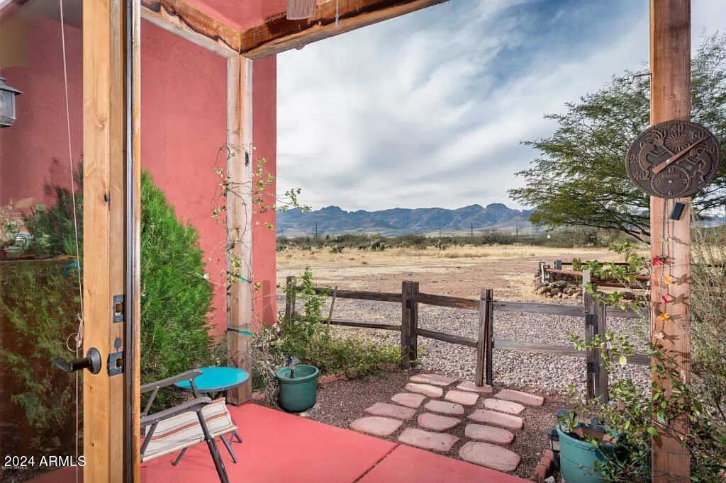 1765 Polonia Court Rio Rico, AZ 85648 - Photo 23 of 26 Side Patio with Double Glass Doors