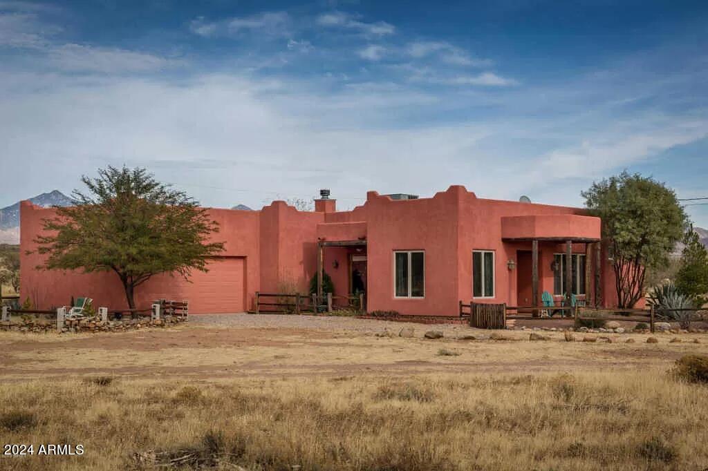 1765 Polonia Court Rio Rico, AZ 85648 - Photo 3 of 26 View of Home with 2 car garage