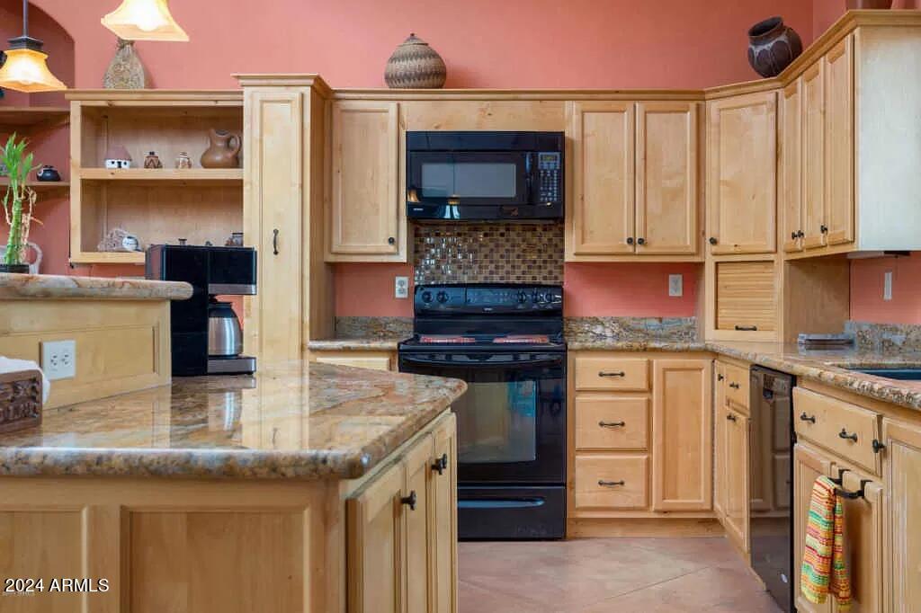 1765 Polonia Court Rio Rico, AZ 85648 - Photo 10 of 26 Alder cabinets / Granite counters