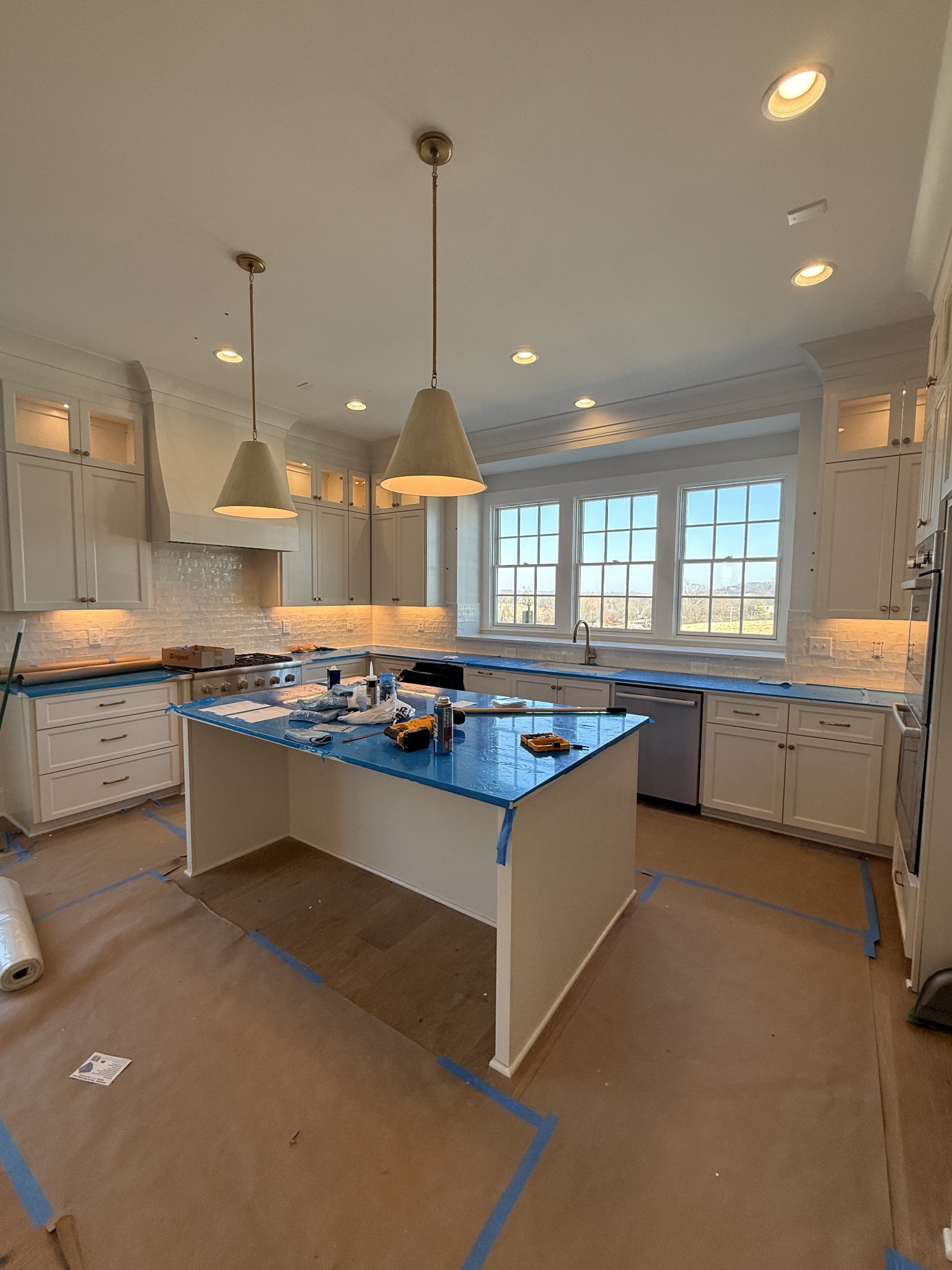 1000 Legrand Avenue Franklin, TN 37064 - Photo 3 of 17 a large kitchen with a large counter top a sink stainless steel appliances and cabinets