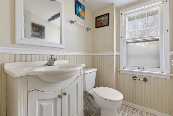 a bathroom with a sink and a toilet