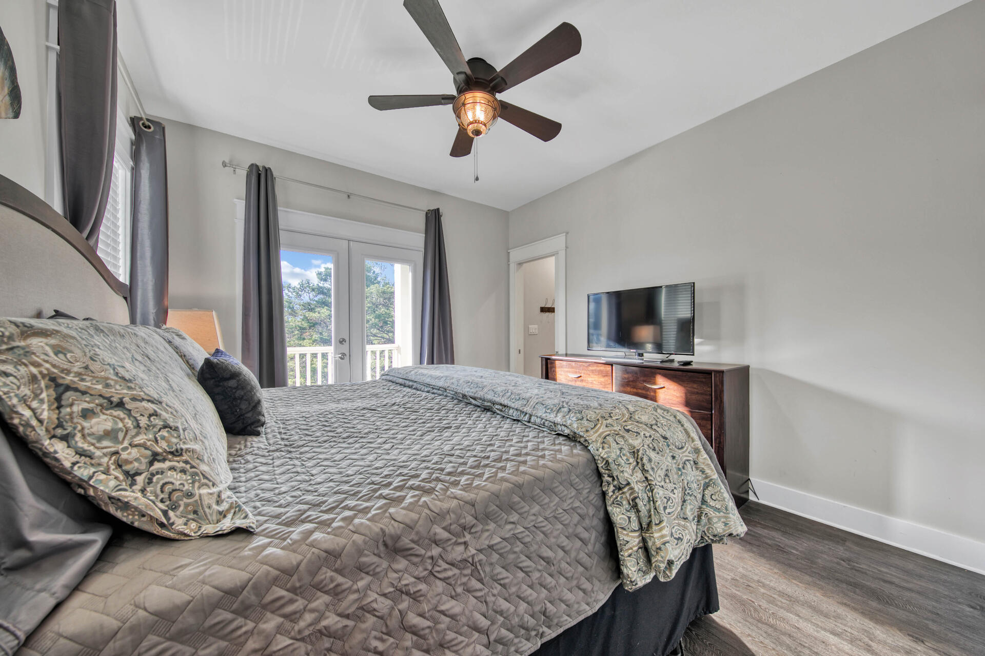 56 Abbey Road Santa Rosa Beach, FL 32459 - Photo 15 of 40 a bedroom with a large bed and a window