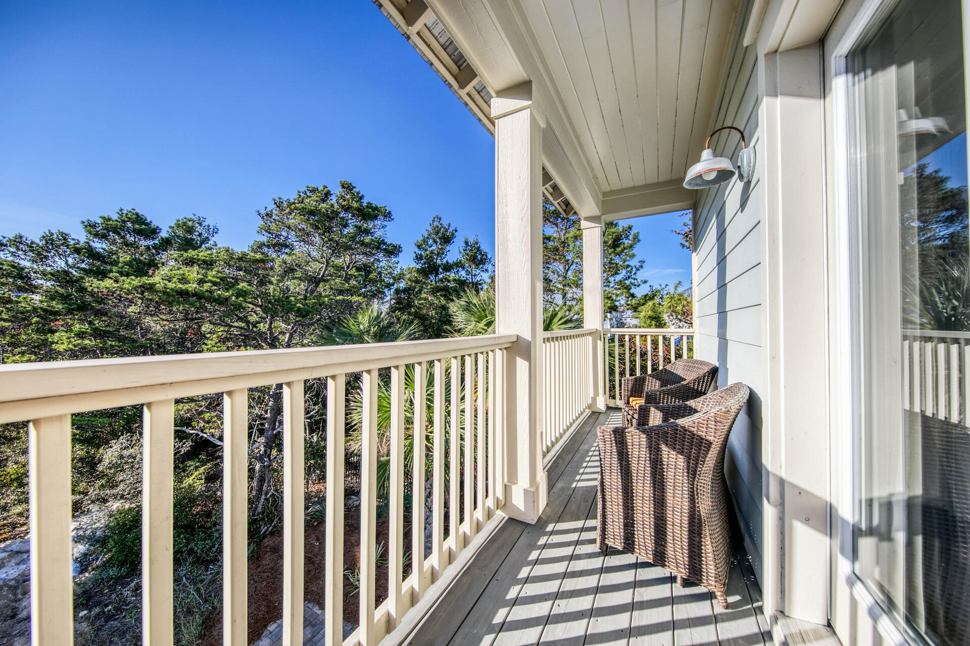 56 Abbey Road Santa Rosa Beach, FL 32459 - Photo 16 of 40 a view of a balcony with wooden floor and fence