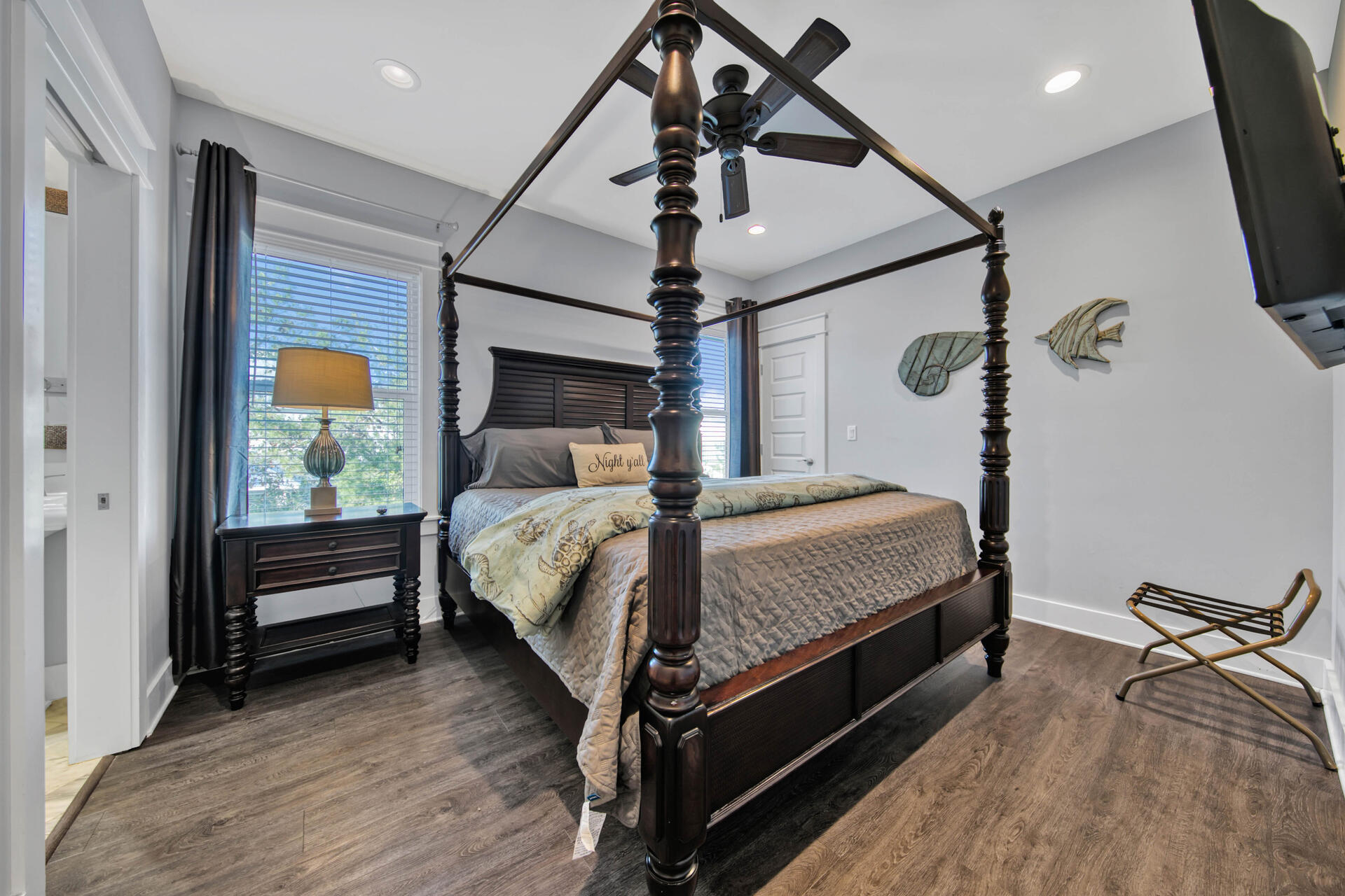 56 Abbey Road Santa Rosa Beach, FL 32459 - Photo 18 of 40 a bedroom with a bed and a chandelier